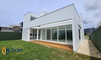 Imagem 4: Casa à venda com arquitetura e acabamentos de alto padrão com 4 suítes em condomínio fecha