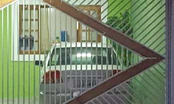 Imagem: Casa com terraço gourmet