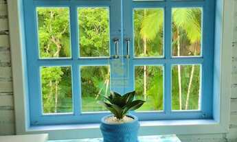 Imagem 7: Casa de tijolinho à vista cercada pela natureza em Rio dos Cedros