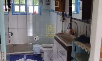 Imagem 6: Casa de tijolinho à vista cercada pela natureza em Rio dos Cedros