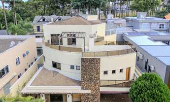 Imagem 4: Casa em condomínio fechado com 5 suítes, 2 escritórios e mais de 700m² de área total – mui