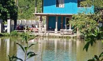 Imagem 3: Chácara em Antonina casa com piscina, vários tanques de peixe, aprisco e nascentes