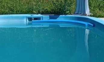 Imagem 2: Chácara em Antonina casa com piscina, vários tanques de peixe, aprisco e nascentes