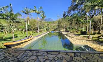 Imagem 1: Chácara com 25.000m² com rio e lagoa com peixes, chalé e casa principal em Morretes, PR