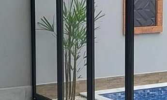 Imagem 3: Casa Térrea finíssimo acabamento 03 dormitórios sendo uma suíte, possui Piscina no Parque