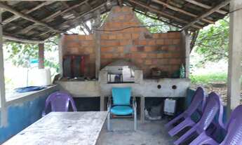 Imagem 7: Vendo uma sitio com uma casa altas e baixa 150,00 mas trocamos em uma casa castanhal