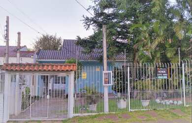 Imagem 3: Casa 5 Quartos, 3 Vagas, Churrasqueira e Pátio para Venda, Porto Alegre / RS