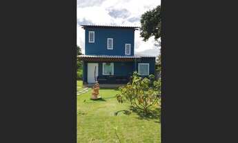 Imagem: Casa de praia com ar campestre