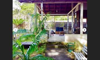 Imagem 3: Vendo um imóvel com três casa na praia