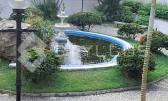 Imagem 7: Em prédio com ampla área de lazer, piscina grande, salão de festas, playground, churrasque