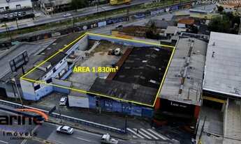 Imagem 5: Galpão com escritórios, estacionamentos e duas casa no local