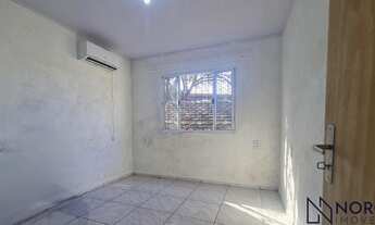 Imagem 6: Casa com 3 dormitórios, 2 banheiros, sala de estar social integrada com a cozinh