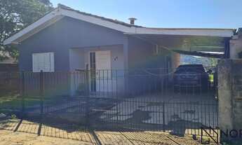 Imagem 2: Casa com 3 dormitórios, 2 banheiros, sala de estar social integrada com a cozinh