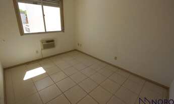 Imagem 7: Apartamento 1 dormitório grande com cozinha e área de serviço separadas da sala