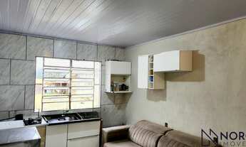 Imagem 4: Casa com 3 dormitórios, 2 banheiros, sala de estar social integrada com a cozinh