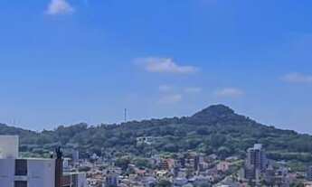 Imagem 7: Apartamento de 3 Dormitórios com Suíte, Churrasqueira e Sacada Panorâmica – Resi