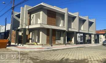 Imagem: Sobrado geminado proximo do mar