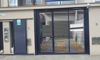 Imagem: Sobrado geminado proximo do mar