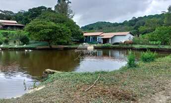 Imagem 7: Sítio de 27 ha, casa principal com 05 suítes, baias de cavalos e lago perene em