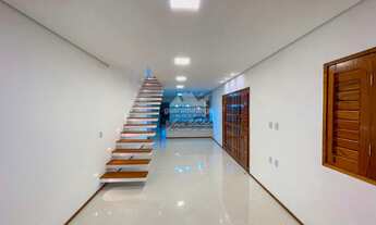 Imagem 5: Casa de 05 suítes, sendo uma master com varanda onde se encontra um pé de laranj