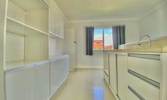 Imagem 6: Casa com três dormitórios e área gourmet em Torres