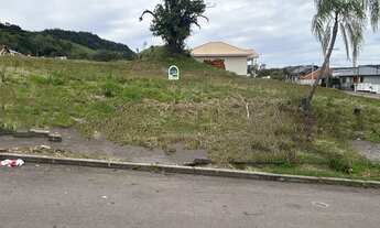 Imagem: Terreno mais alto que a rua no Arroio grande