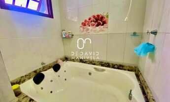 Imagem 6: Casa com piscina e banheira de hidromassagem