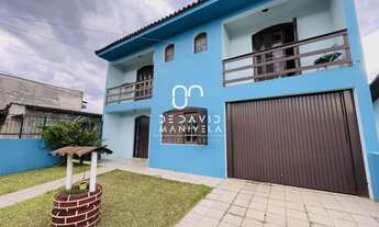 Imagem: Casa de dois andares com 4 dormitórios