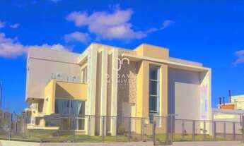 Imagem: Com lareira em um living três ambientes