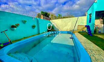 Imagem 2: Casa com piscina e banheira de hidromassagem