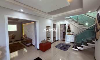 Imagem 6: Vendo casa de 5/4 sendo 02 suítes com 03 salas e 03 vagas de uso mixto residenci