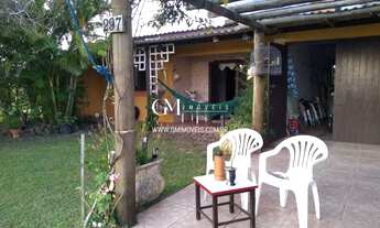 Imagem: Tranquilidade à Beira-Mar Casa de Praia