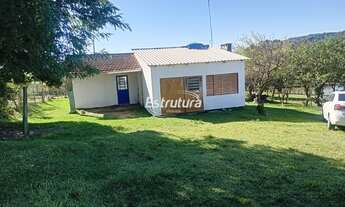 Imagem 1: ???? Chácara de 16.500 m² na Beira do Asfalto com Casa, Galpão e Pomar!