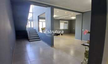 Imagem 2: Casa semimobiliada de 3 Suítes com sala e cozinha integrados