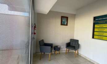 Imagem 3: Sala comercial para locação com ar-condicionado e móveis planejados