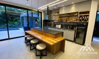 Imagem 5: Casa à venda no módulo 24 da Riviera com 5 suítes e conceito moderno