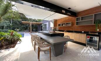 Imagem 7: Casa à venda no módulo 16 da Riviera com 5 suítes, moderna e mobiliada