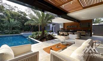 Imagem 5: Casa à venda no módulo 16 da Riviera com 5 suítes, moderna e mobiliada