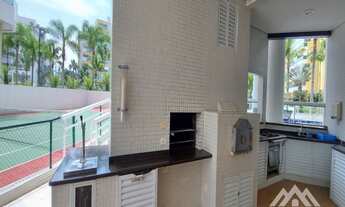 Imagem 4: Apartamento á venda na Riviera De São Lourenço com vista para o mar e sacada envidraçada