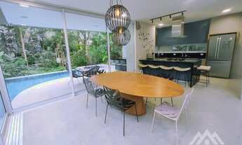 Imagem 6: Casa a venda na Riviera, módulo 28 com 5 suítes, moderna e mobiliada