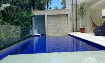 Imagem 4: Casa com 5 suítes e ampla área externa a venda na Riviera, módulo 24