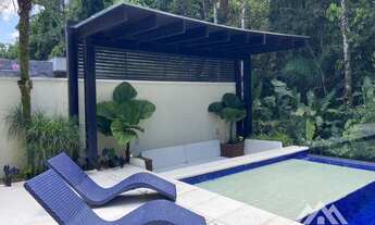 Imagem 2: Casa com 5 suítes e ampla área externa a venda na Riviera, módulo 24