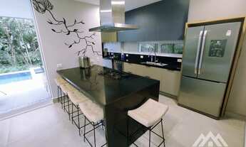 Imagem 7: Casa a venda na Riviera, módulo 28 com 5 suítes, moderna e mobiliada