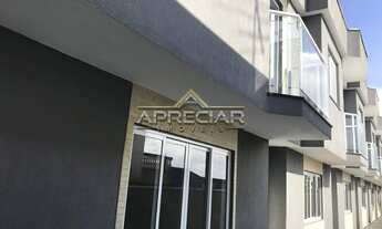 Imagem 2: Sobrados com 3 dormitórios, suíte e duas vagas de garagem no bairro de Vila Ré