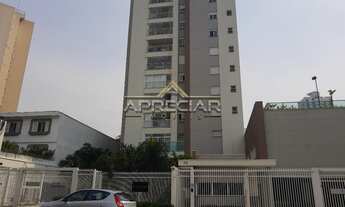 Imagem 2: Apartamento com dois dormitórios sendo 1 suíte com armários, cozinha planejada com cooktop