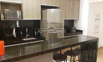 Imagem 6: Apartamento com dois dormitórios sendo 1 suíte com armários, cozinha planejada com cooktop