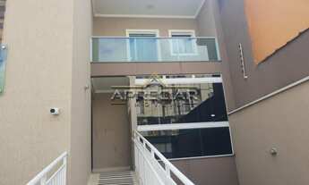 Imagem 3: Apartamento com dois dormitórios, sala com varanda gourmet, cozinha planejada com cooktop