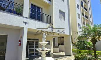 Imagem 2: Apartamento de 2 dormitórios com armários, cozinha com armários, Sala com varanda, sofá e