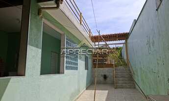 Imagem 6: Casa com dois dormitórios sendo 1 suíte, sala, cozinha com armários embutidos, 1 banheiro