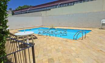 Imagem 4: Apartamento de 2 dormitórios com armários, cozinha com armários, Sala com varanda, sofá e